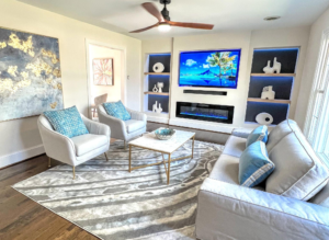 white, blue, and gold-themed living area