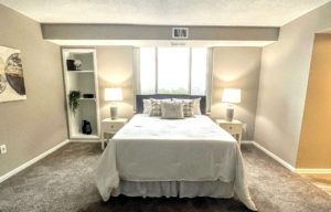 A well-set room with two side lamps