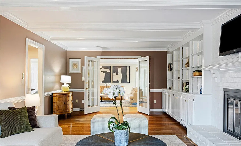 Professionally staged living room with built-ins on Ballantrae Ct in Henrico, Virginia
